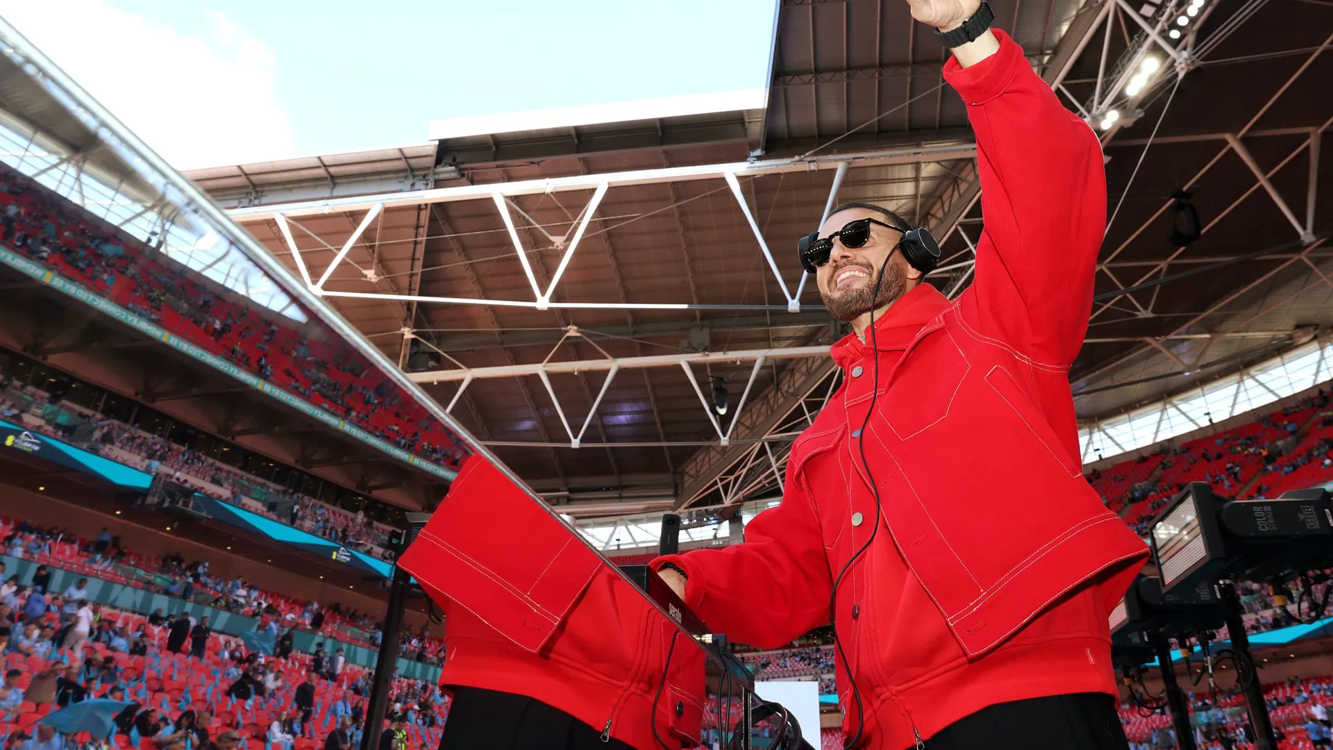 DJ performing pitchside at Wembley Stadium