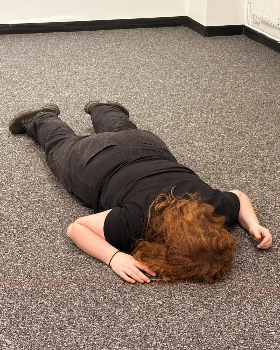 Freya taking a well-earned break on the office floor