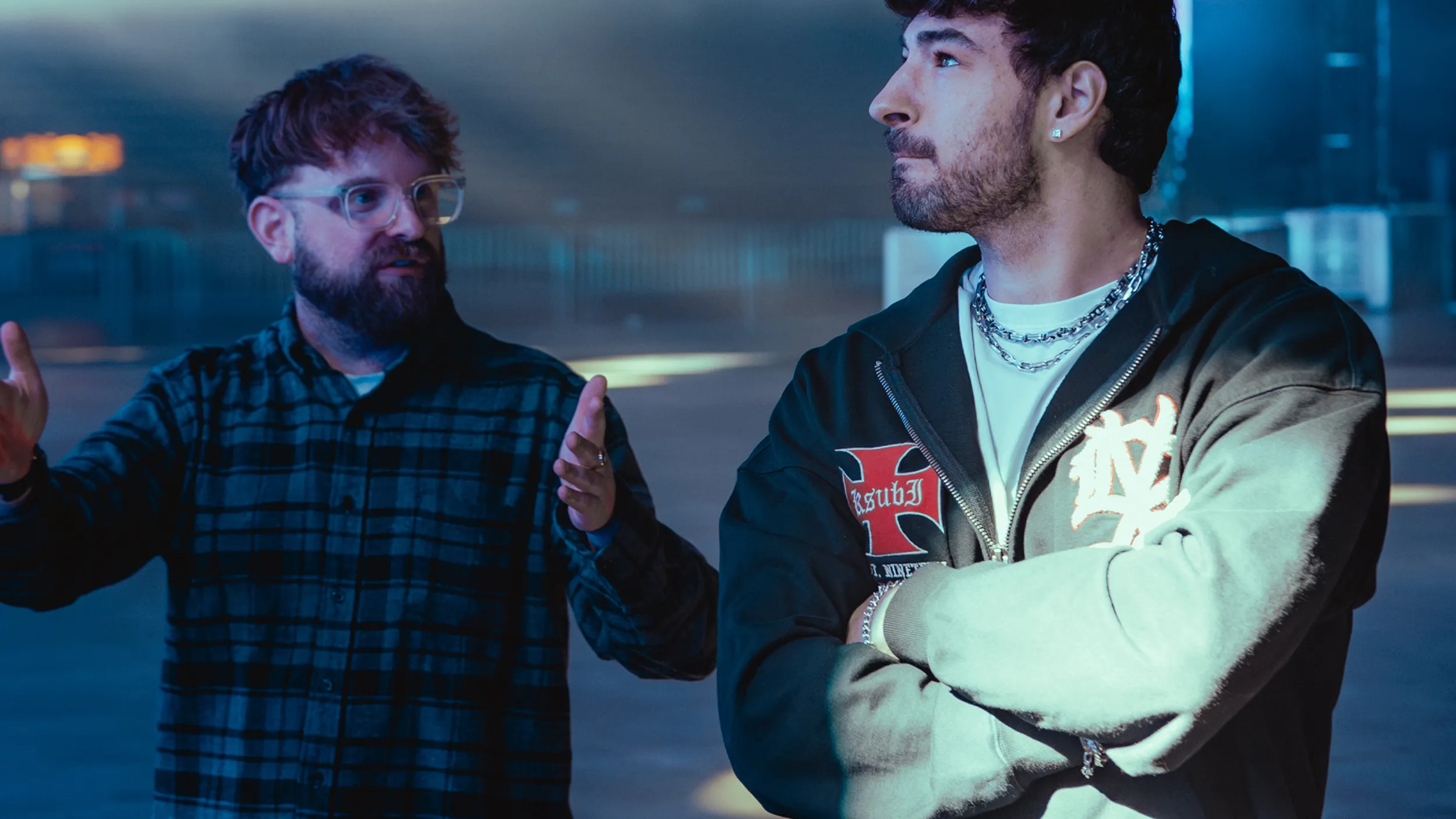 a lighting designer chatting through a design with artist Crankdat