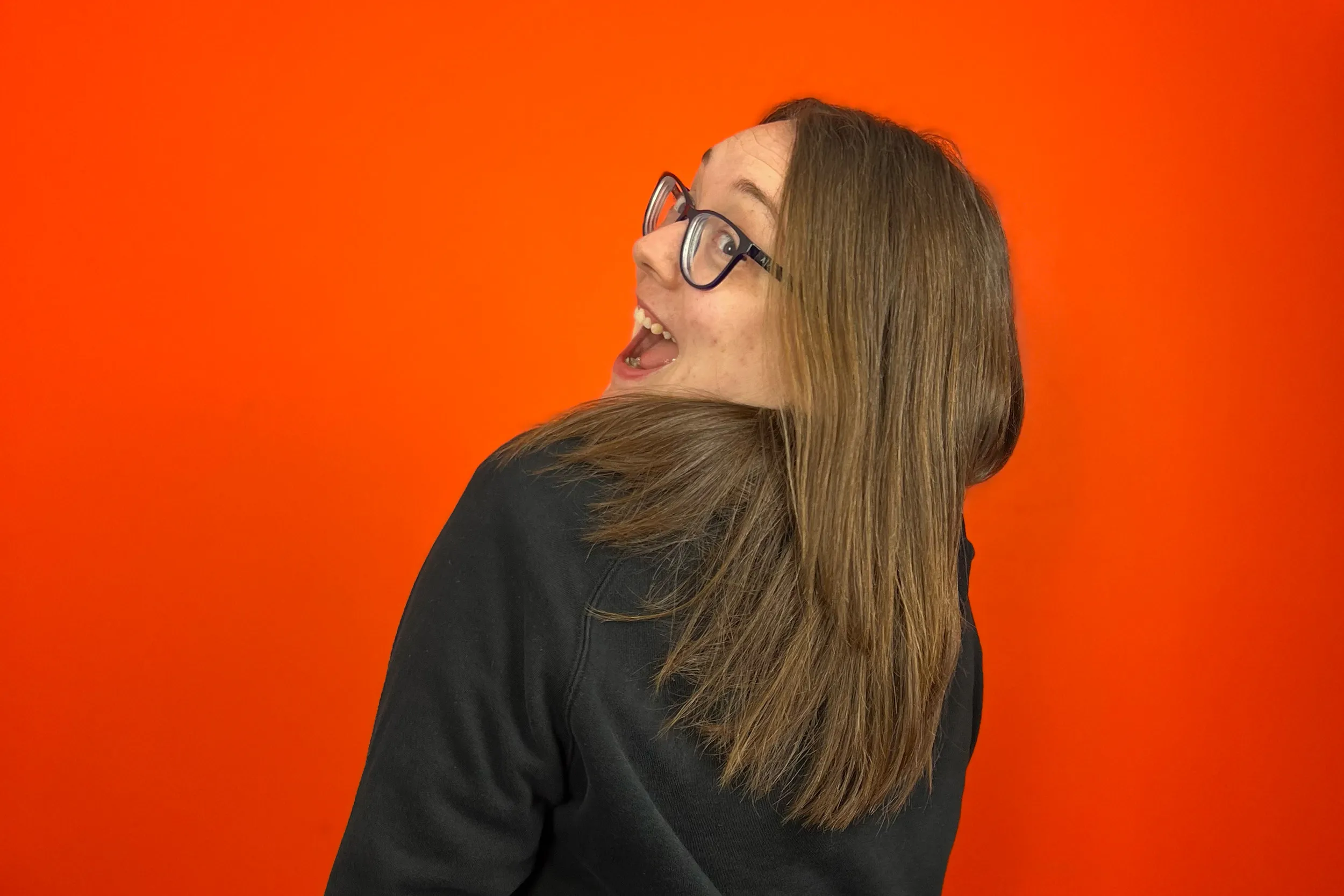 Sarah, laughing over her shoulder.